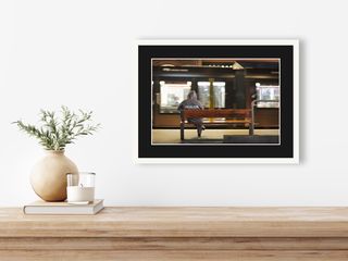 Wynyard tram stop, Sydney | Man on bench | 2025 shown in a room