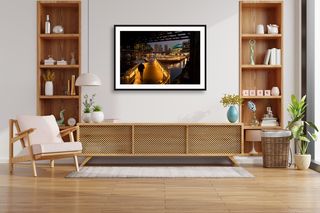 Darling Harbour, Sydney | Lone figure in rain | 2026 shown in a room