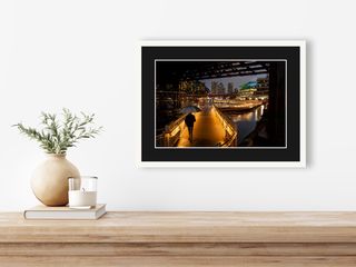 Darling Harbour, Sydney | Lone figure in rain | 2026 shown in a room
