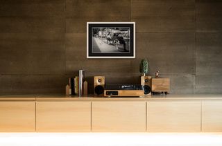 George St, Sydney | Happy man on bench | 2025 shown in a room