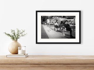 George St, Sydney | Happy man on bench | 2025 shown in a room