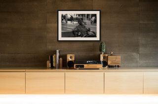 George St, Sydney | Character on bench | 2026 shown in a room